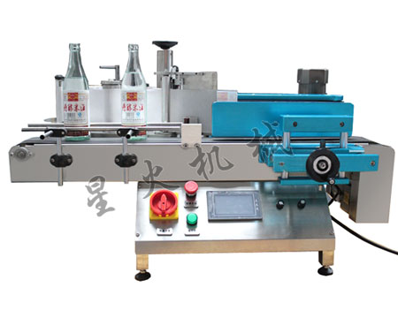 全自動立式圓瓶定位(wèi)貼標機